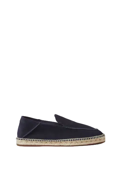 Blue loafer shoe with a gold buckle on a white background