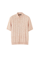 Pink textured polo shirt on a light beige background