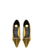 A pair of pointed-toe pumps in metallic gold and black with snakeskin trim, shown from a top-down view on a light gray background.