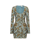 A long-sleeve mini dress with a scoop neckline, featuring an intricate gold and brown floral paisley pattern over a dusty blue base, shown against a plain light gray background.