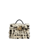 A small structured handbag with a curly, textured faux-fur or bouclé exterior in cream and black, a black top handle, and a gold-tone interlocking CC clasp on the front, photographed on a clean white studio background.