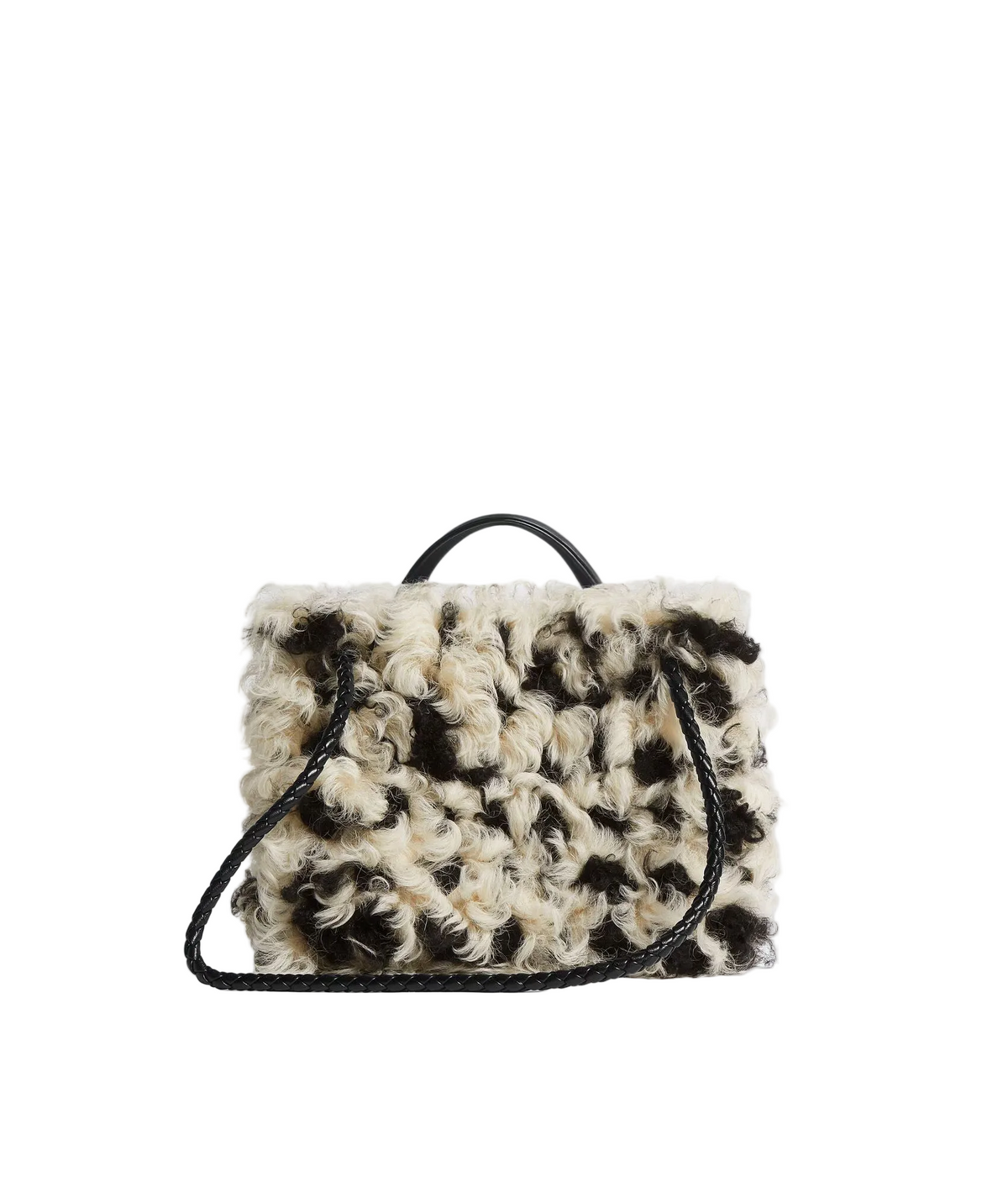 A small textured handbag with a black and cream curly fur-like pattern, featuring a black top handle and a long black shoulder strap, set against a plain white background.