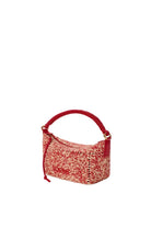 Red handbag with a textured pattern on a white background