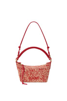 Red woven handbag with a strap on a white background