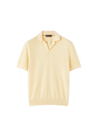 Light yellow polo shirt on a white background