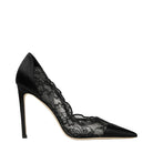Black high-heeled shoe with lace detailing on a light gray background