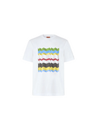 White t-shirt with colorful zigzag pattern on a light gray background