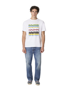 Person wearing a white t-shirt with colorful stripes and blue jeans on a white background