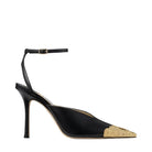 A single black leather high-heeled sandal with a pointed toe featuring a textured gold cap, a slim ankle strap with a gold buckle, and a stiletto heel, shown against a plain white background.