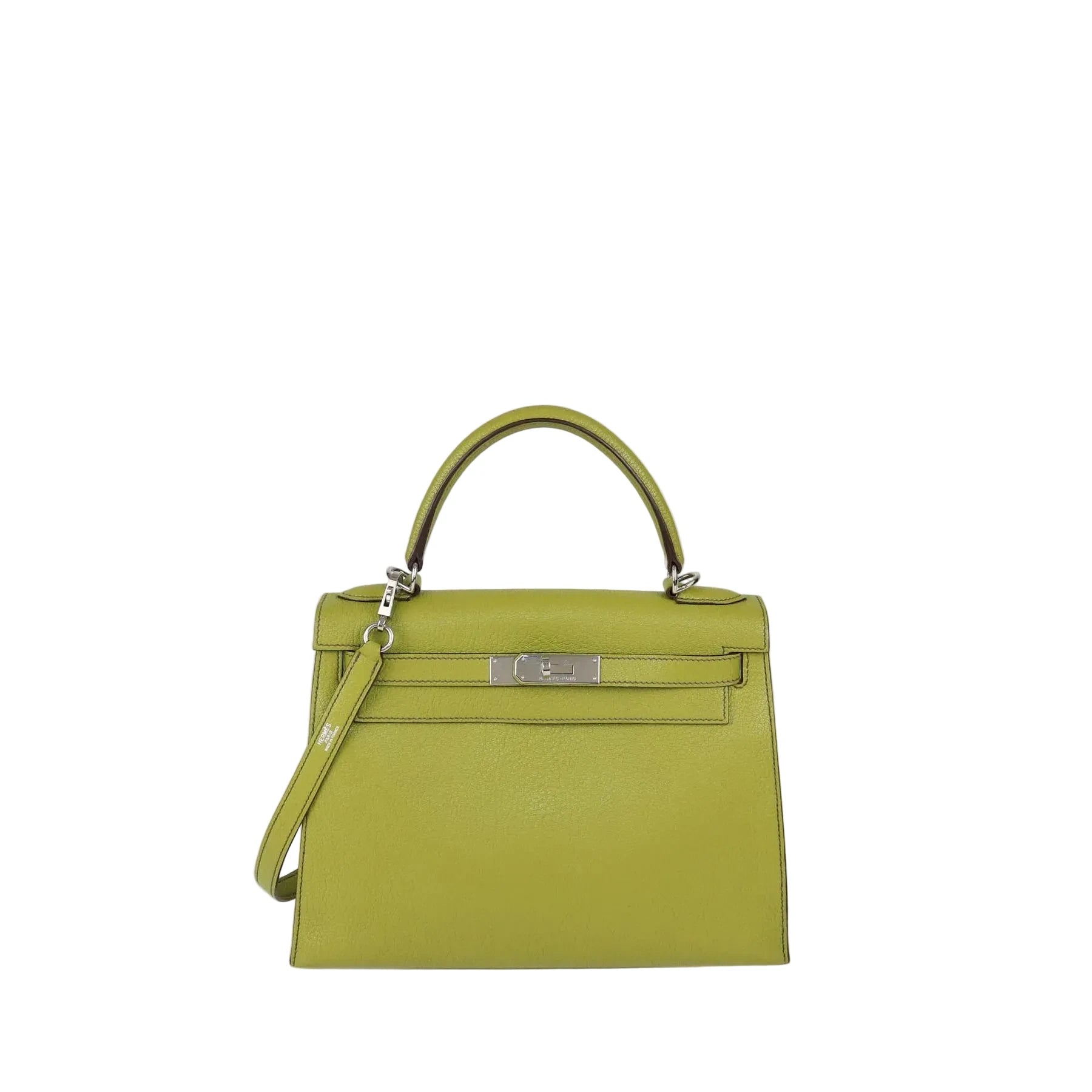 A structured lime green leather handbag with silver-tone hardware, featuring a top handle, a detachable shoulder strap, and a front flap closure, photographed against a plain light gray background.