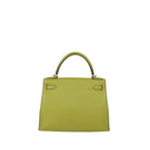 A structured top-handle handbag in textured olive green leather, featuring silver-tone hardware and a curved top handle, photographed against a plain light gray background.