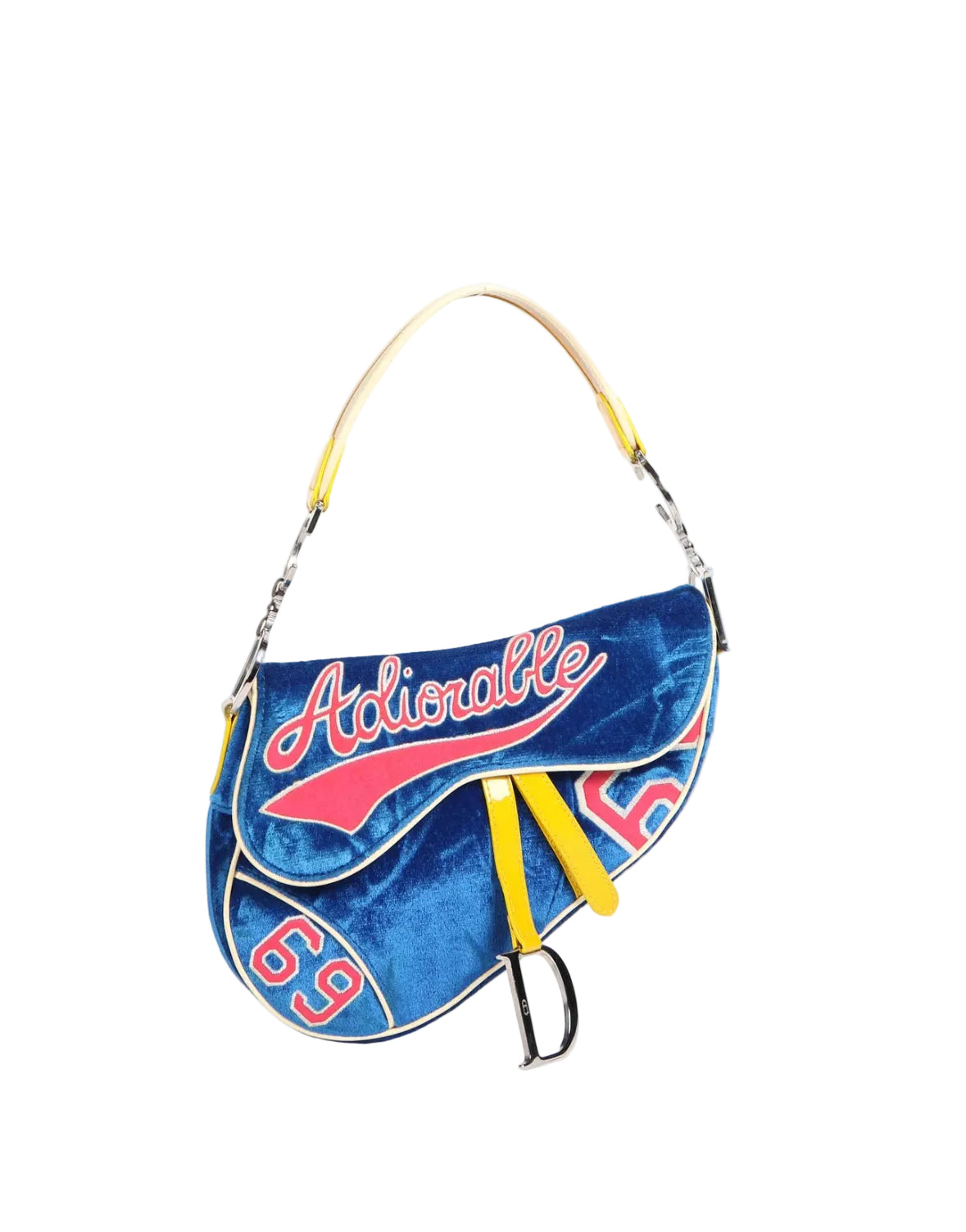 A blue velvet saddle-style handbag with a yellow leather handle, featuring 'Actionable' in red script and the number '65' in red on a white background.