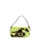 A Fendi shoulder bag in lime green and dark brown cowhide with a dark brown leather strap and a gold-tone FF logo buckle on the front flap.