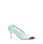 A mint green satin high-heeled pump with a contrasting red pointed toe, shown from a side profile on a clean white background.