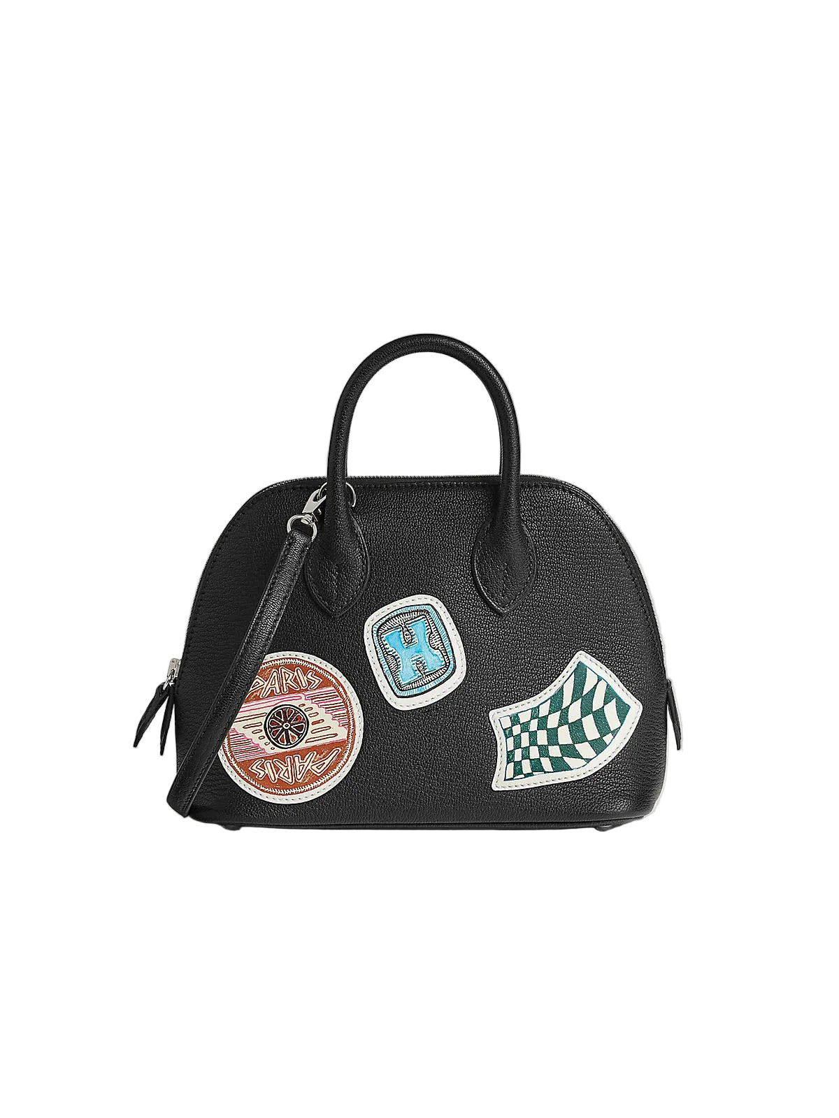 A black textured leather dome handbag with dual top handles, featuring three colorful decorative patches on the front, set against a solid light beige background.