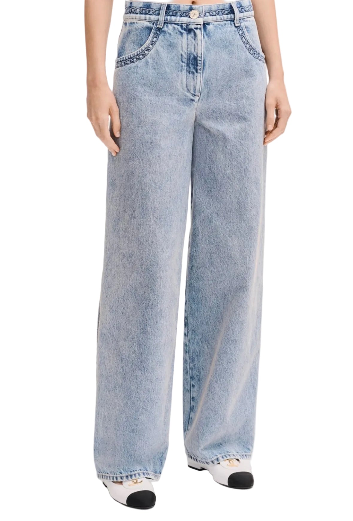 Light blue jeans worn by a person on a white background