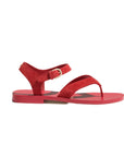 Red sandal with a strap on a light gray background