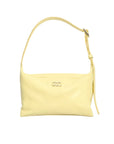 Yellow handbag with Chanel logo on a white background
