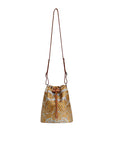 Patterned bucket bag with a strap on a light beige background
