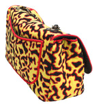 Yellow and black patterned handbag with red accents on a white background