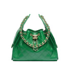 Green quilted handbag with gold chain detail on a white background