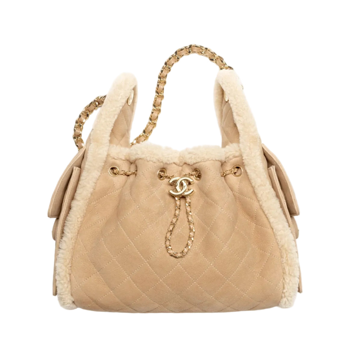 A beige quilted suede drawstring handbag with fluffy cream shearling lining, gold-tone chain handles, and a gold interlocking CC logo on the front, photographed against a plain white background.