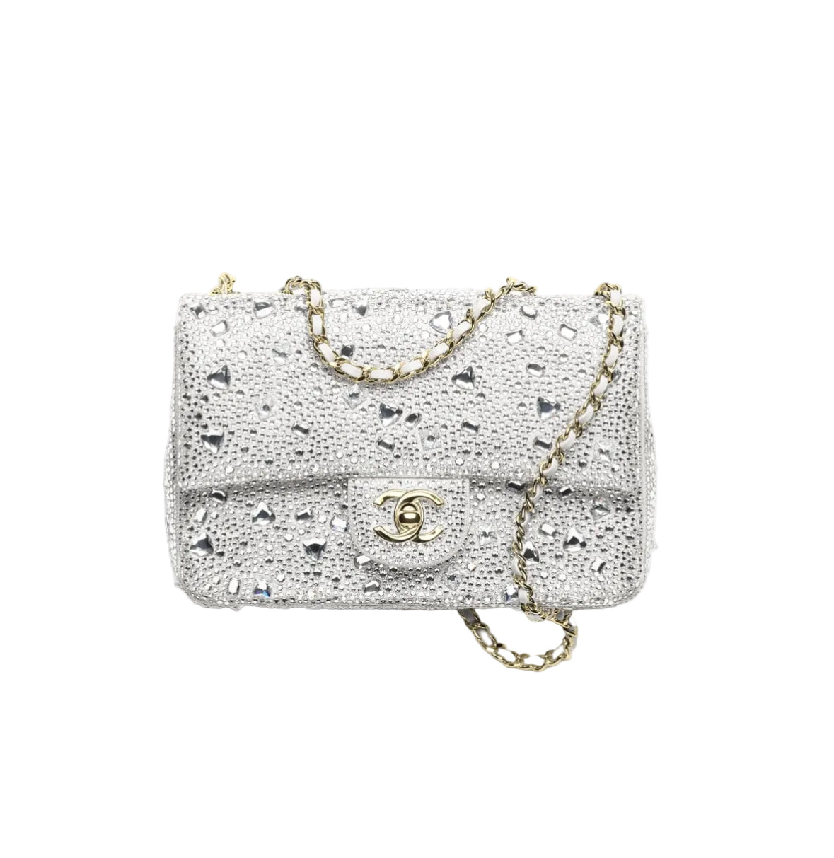 A silver pebbled leather handbag with a gold-tone chain strap and a gold interlocking CC logo on the front flap, photographed on a clean white background.