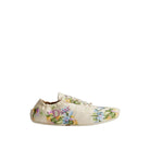 Floral-patterned sneaker on a white background