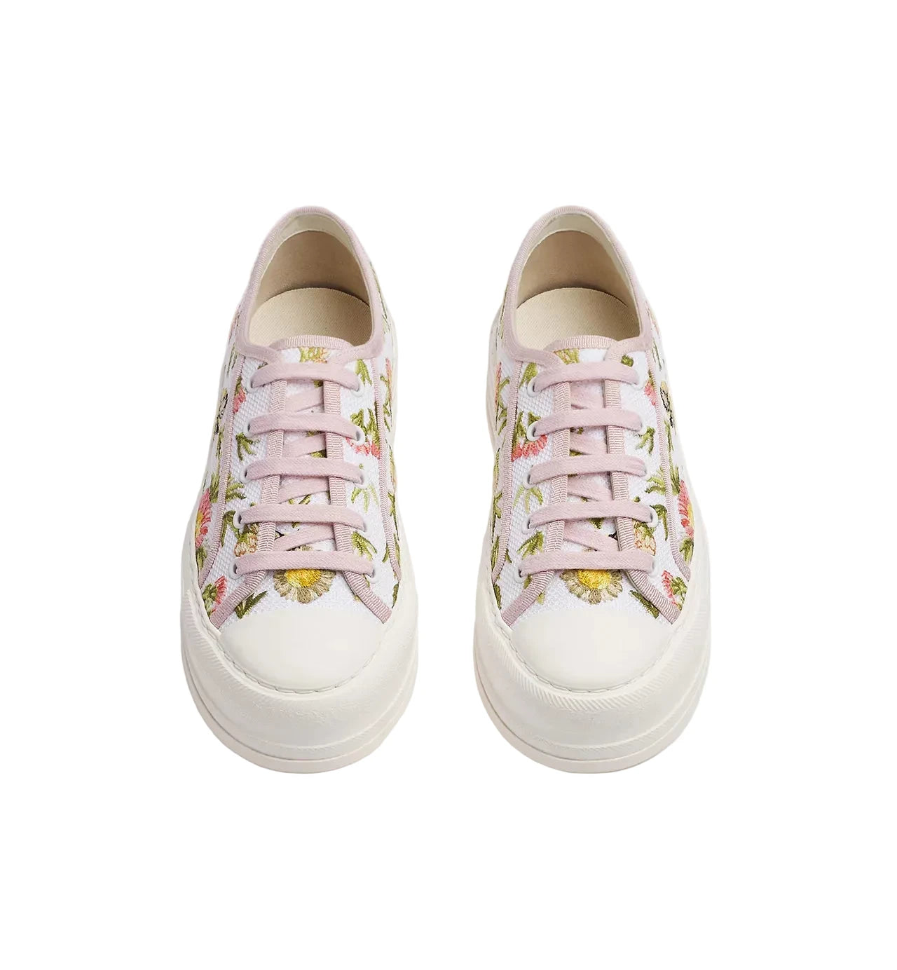 Pair of floral sneakers on a white background