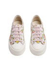 Pair of floral sneakers on a white background