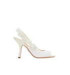 White high-heeled shoe with a slingback design on a light gray background