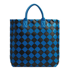 Blue and black woven tote bag on a white background