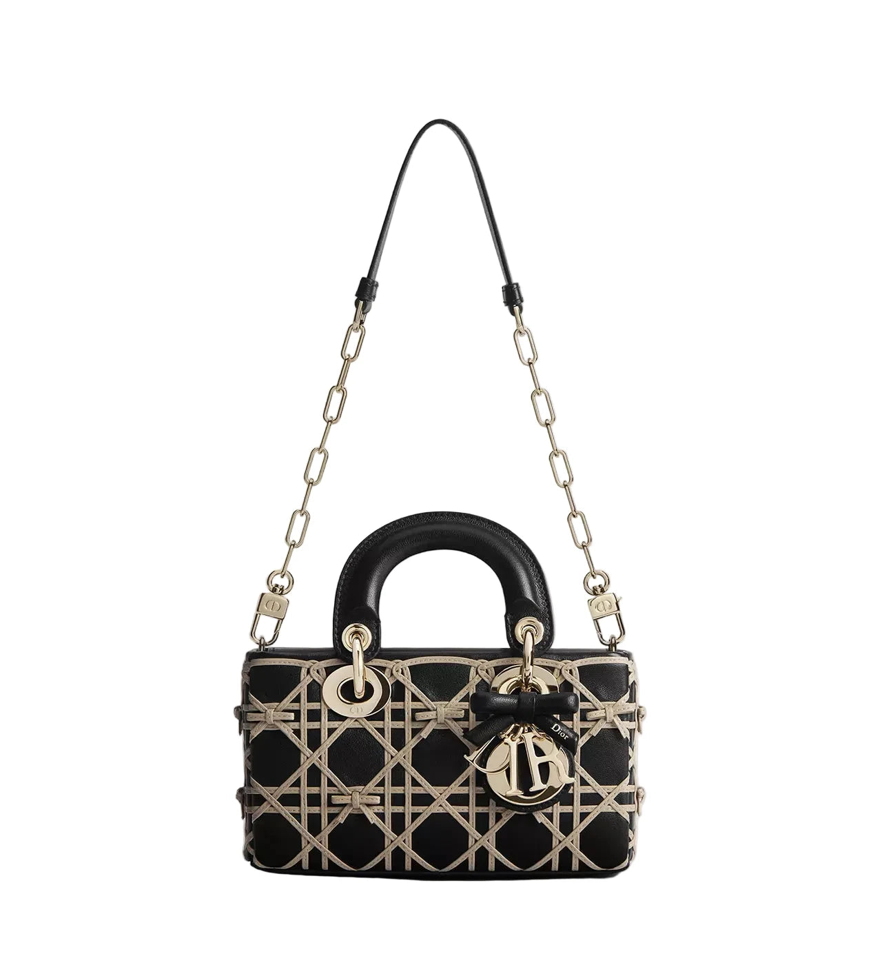 Black handbag with gold accents on a light gray background