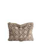 Quilted beige handbag with chain detail on a light gray background
