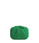 Green clutch bag with 'Dior' logo on a light gray background