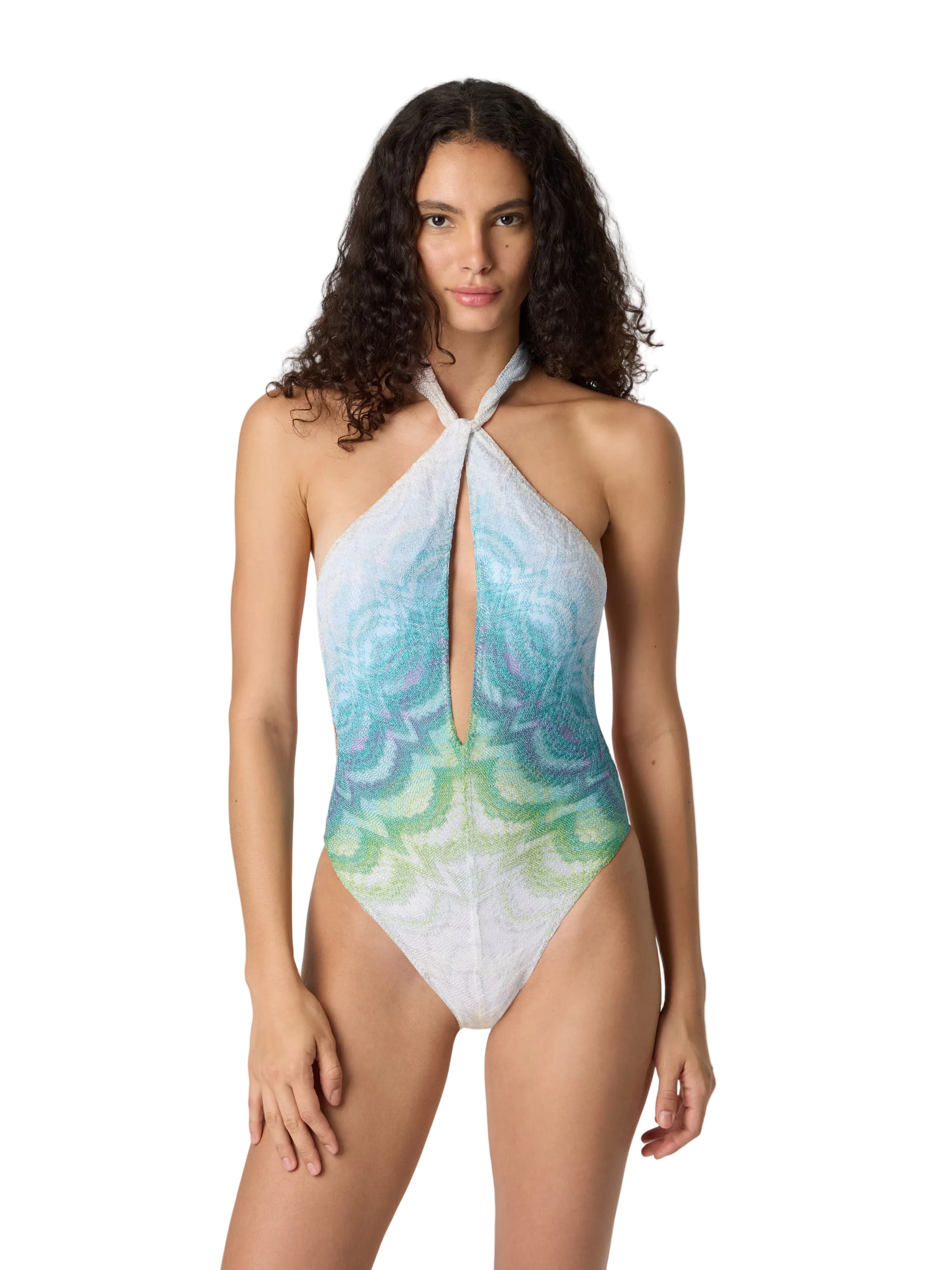 Woman wearing a colorful halter neck swimsuit on a white background