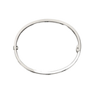 A minimalist silver-toned metal bangle bracelet with a polished finish, photographed from directly above on a clean, off-white background.