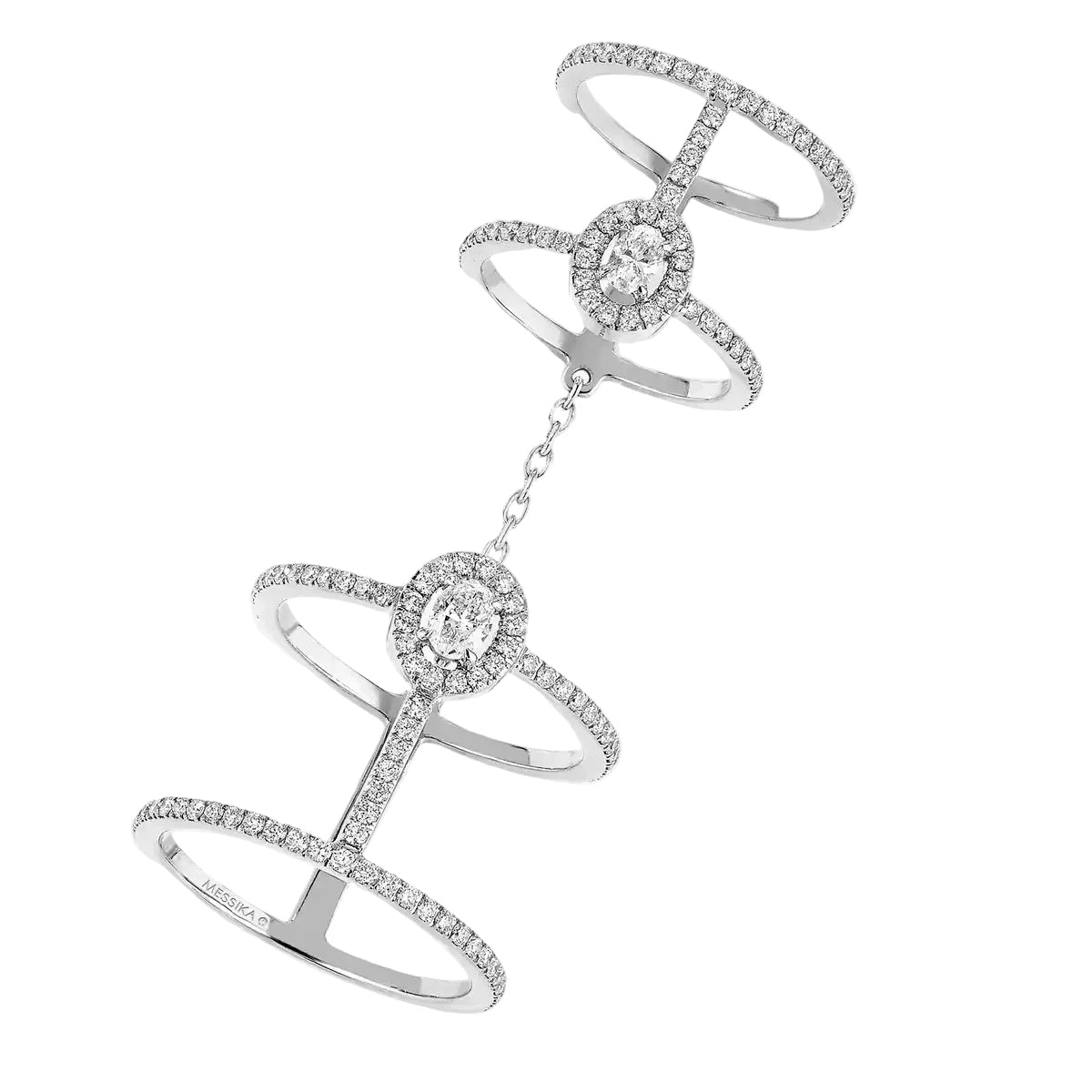 Silver bracelet with diamond accents on a light gray background