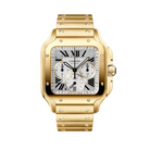 Gold Cartier watch on a light beige background