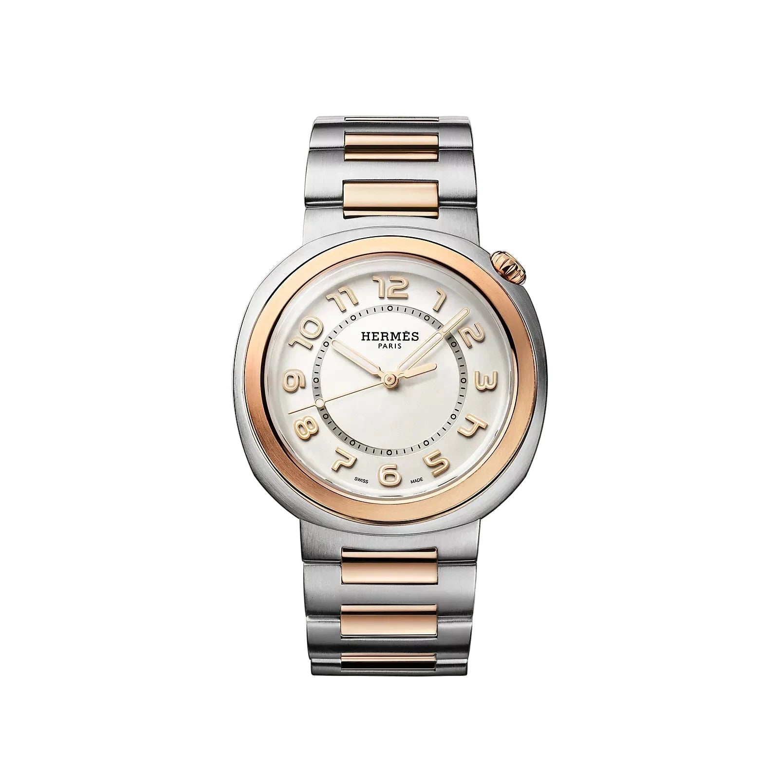 Hermes watch with silver and rose gold band on beige background