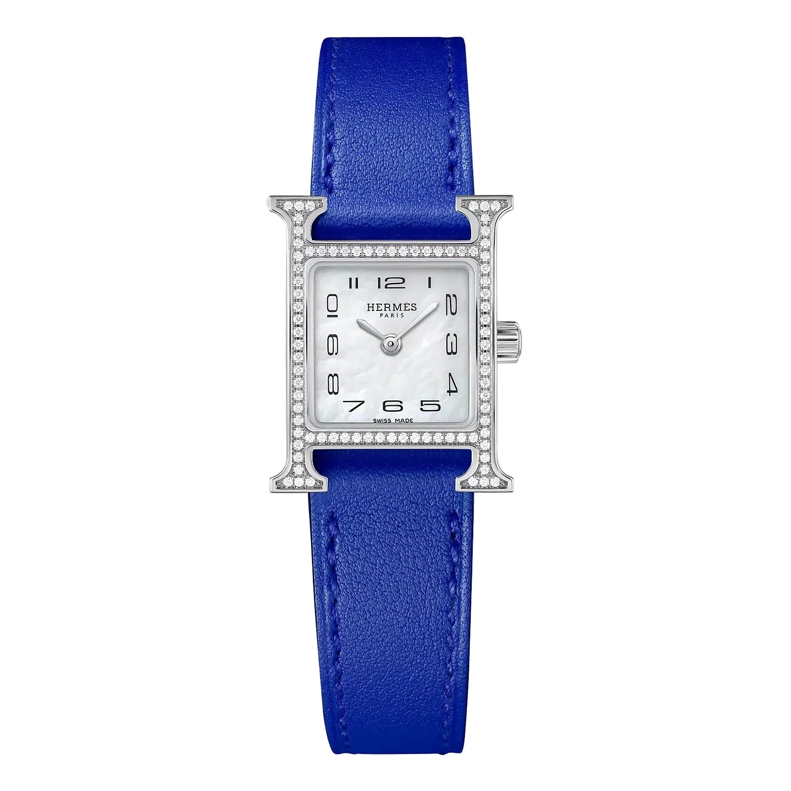 Hermes watch with blue strap on a light gray background
