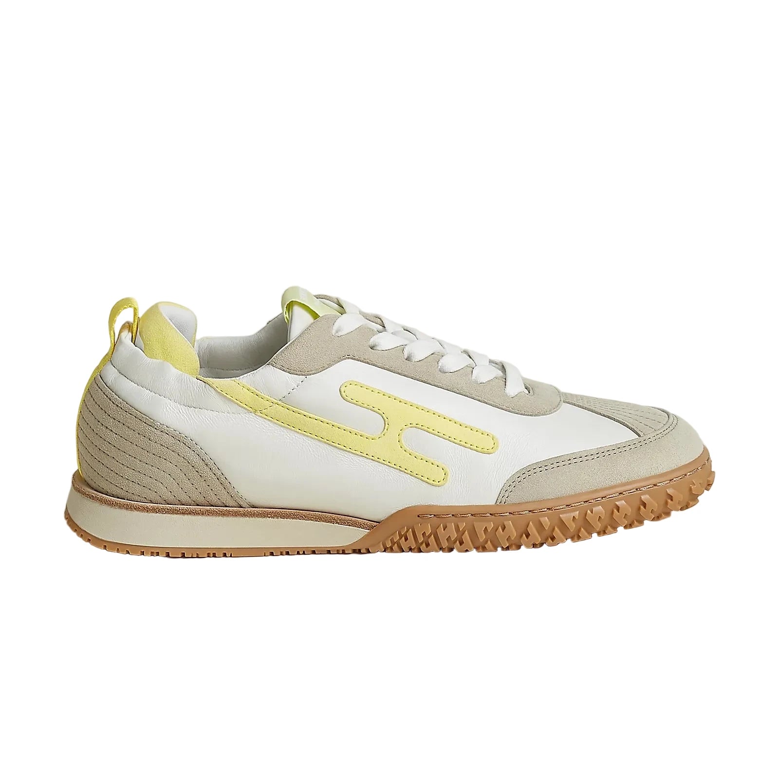 Sneaker with white and beige design on a light gray background