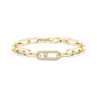 Gold chain bracelet with diamond accents on a white background