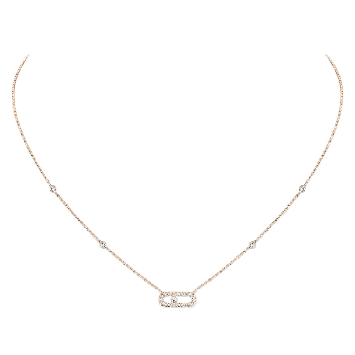 Delicate gold necklace with small diamonds on a white background