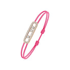 Pink bracelet with a gold and diamond clasp on a white background