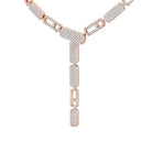 Rose gold necklace with diamond accents on a white background