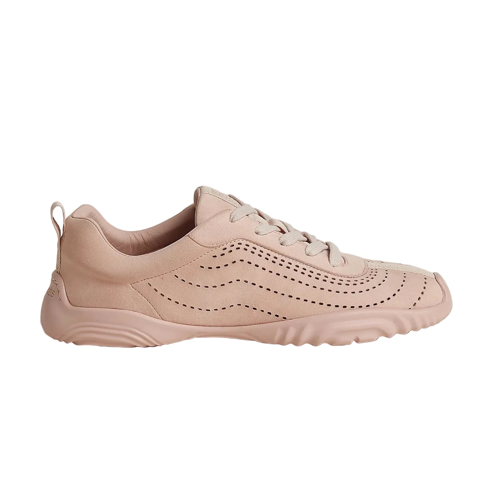 Pink sneaker on a light beige background