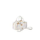 A white faux leather top-handle satchel bag with gold-tone studs and hardware, featuring a zippered top and a detachable shoulder strap, set against a solid light beige background.