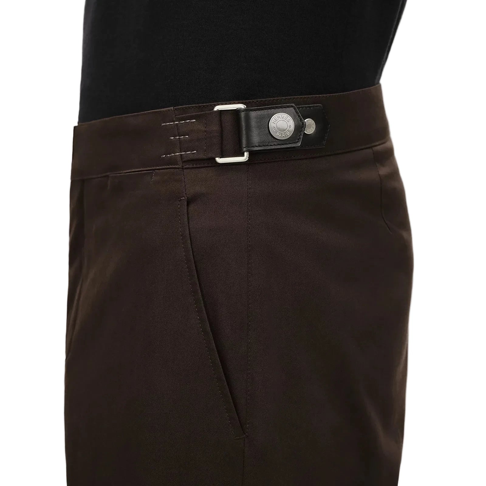 Brown pants with a belt on a beige background