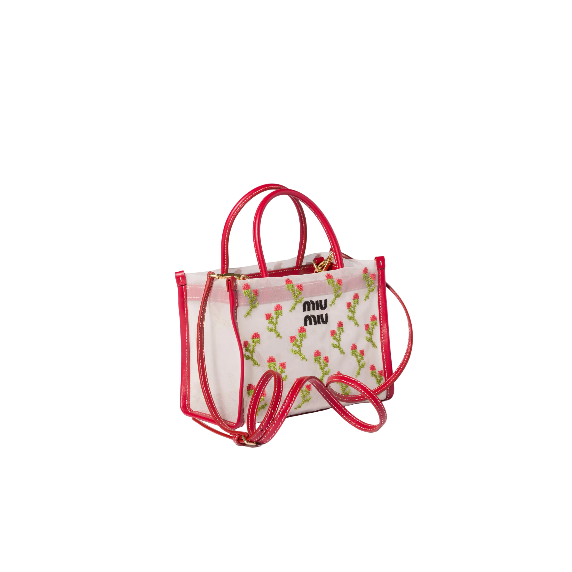 Designer handbag with floral pattern and red accents on a beige background